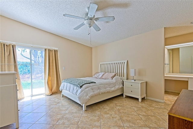 bedroom featuring access to outside, light tile patterned floors, vaulted ceiling, and a textured ceiling