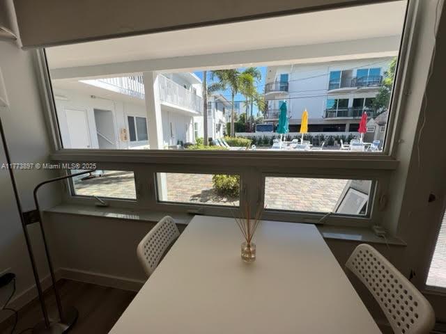 4228 N Ocean Dr Unit 17, Lauderdale By The Sea, FL 33308 - dining space with wood finished floors