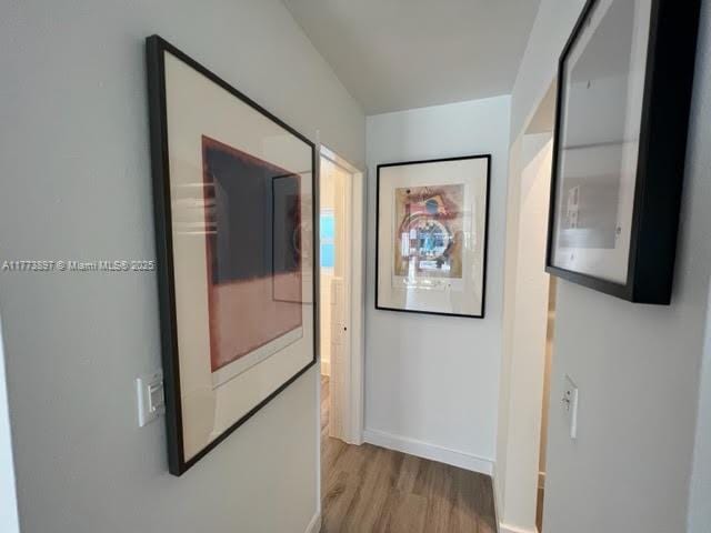 4228 N Ocean Dr Unit 17, Lauderdale By The Sea, FL 33308 - hall featuring baseboards and light wood-type flooring