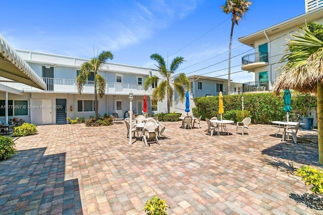 4228 N Ocean Dr Unit 17, Lauderdale By The Sea, FL 33308 - view of patio / terrace featuring outdoor dining space and a balcony