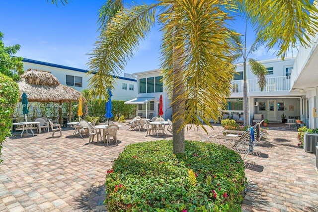 4228 N Ocean Dr Unit 17, Lauderdale By The Sea, FL 33308 - view of patio / terrace featuring central AC and a gazebo