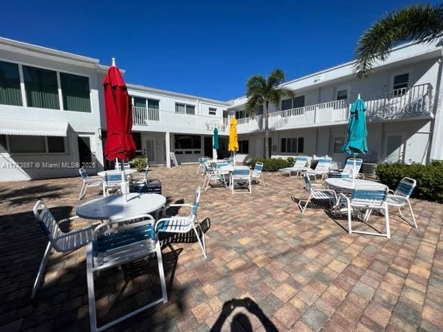 4228 N Ocean Dr Unit 17, Lauderdale By The Sea, FL 33308 - view of patio with outdoor dining space