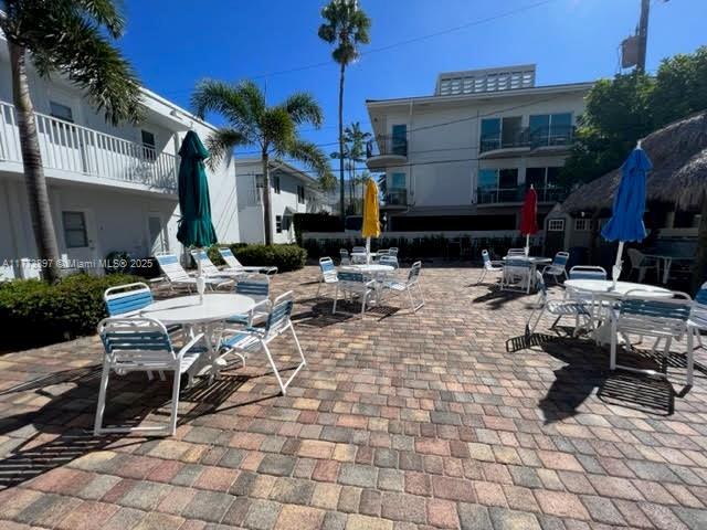 4228 N Ocean Dr Unit 17, Lauderdale By The Sea, FL 33308 - view of patio / terrace with outdoor dining space