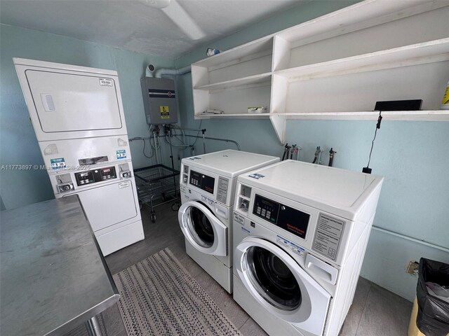 4228 N Ocean Dr Unit 17, Lauderdale By The Sea, FL 33308 - common laundry area featuring water heater, washing machine and dryer, and stacked washer and dryer