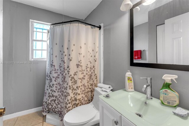 425 NW 8th Ave, Homestead, FL 33030 - full bathroom with vanity, baseboards, tile patterned flooring, a shower with curtain, and toilet