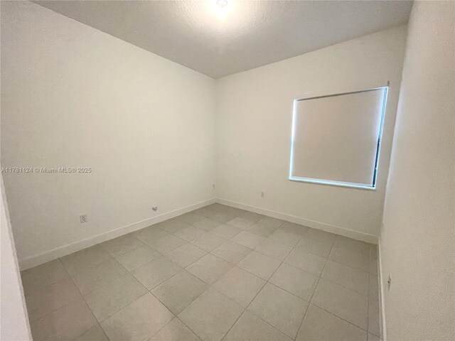4506 SW 174th Ave, Miramar, FL 33029 - spare room with baseboards