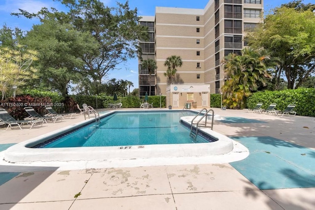 community pool with a patio