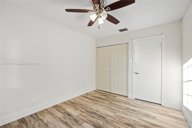 9239 W Sunrise Blvd, Plantation, FL 33322 - unfurnished bedroom featuring visible vents, baseboards, light wood finished floors, and a closet
