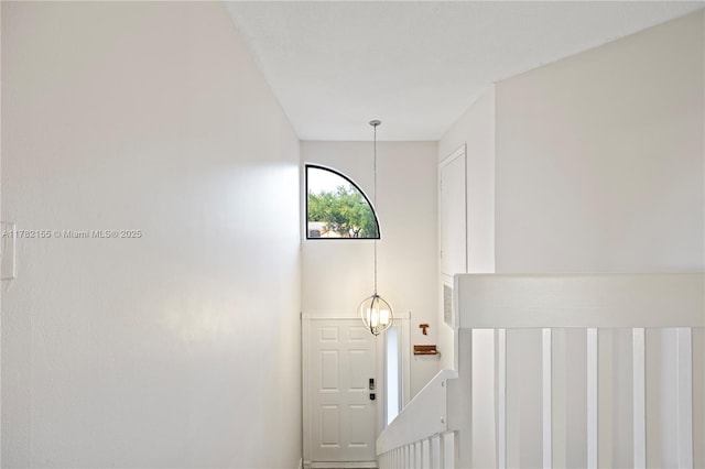 9239 W Sunrise Blvd, Plantation, FL 33322 - foyer entrance featuring a notable chandelier