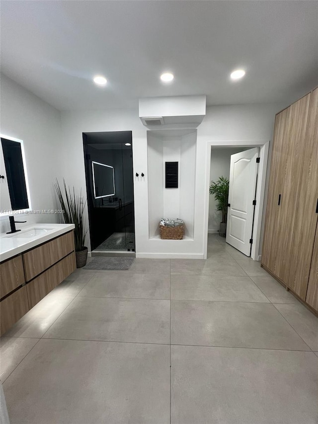 interior space featuring recessed lighting, a stall shower, finished concrete flooring, and vanity