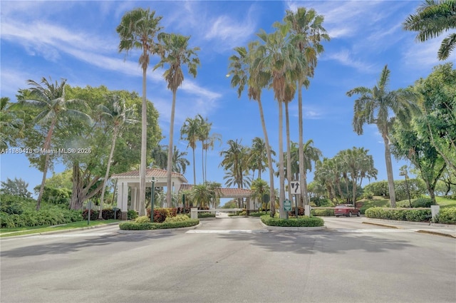 10770 NW 66th St Unit 203, Doral, FL 33178 - view of asphalt road with curbs