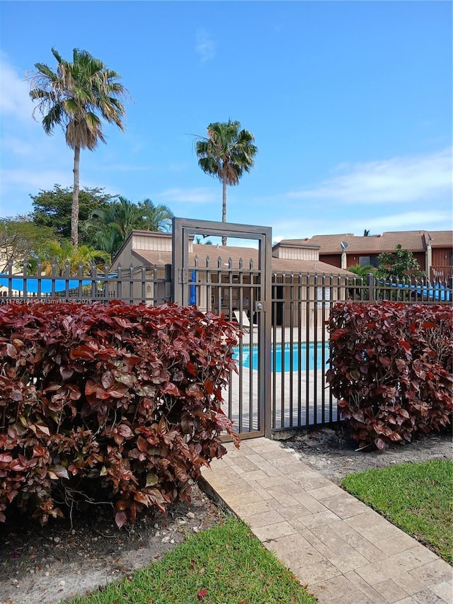 view of pool with fence