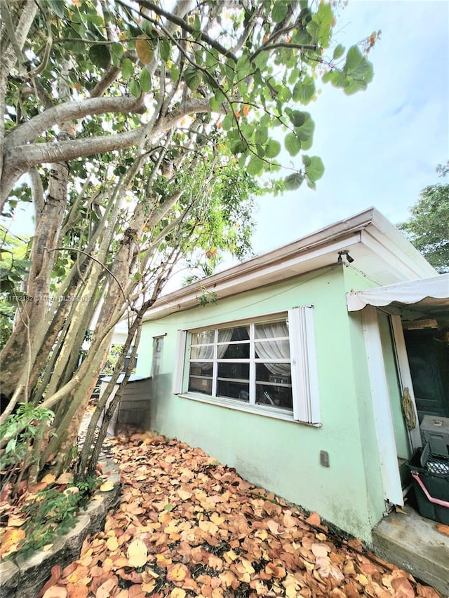 view of property exterior with stucco siding