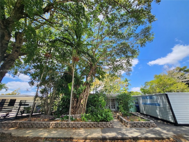 view of front of house with fence