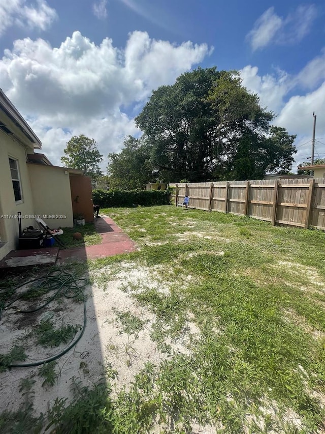 2801 Mayo St, Hollywood, FL 33020 - view of yard with a patio and fence