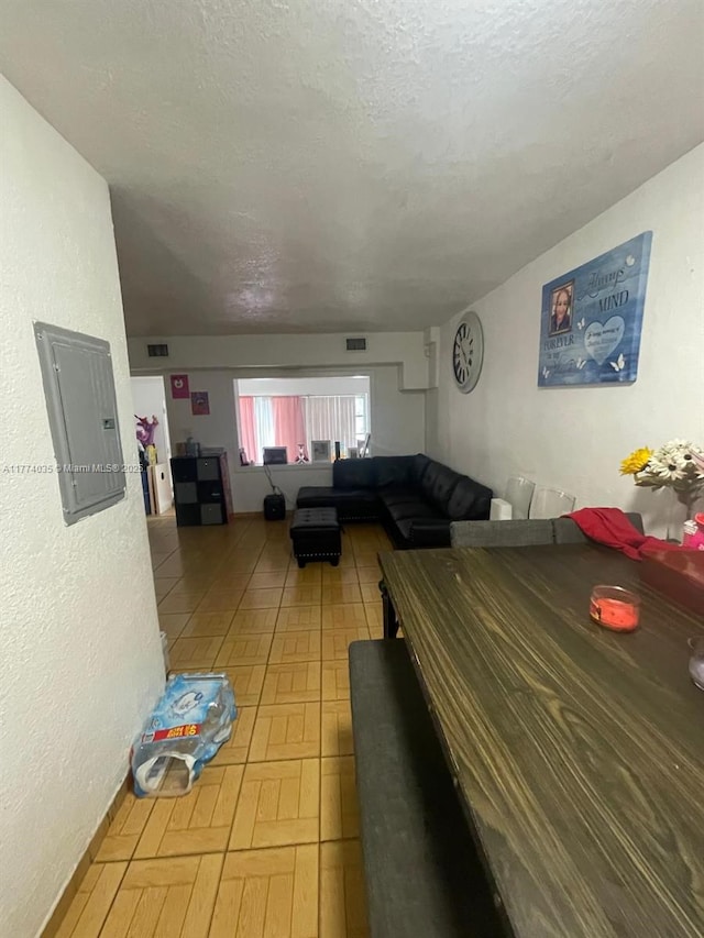 2801 Mayo St, Hollywood, FL 33020 - living room featuring visible vents and a textured ceiling
