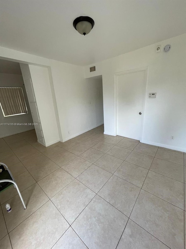 2801 Mayo St, Hollywood, FL 33020 - unfurnished bedroom with light tile patterned floors, baseboards, and visible vents