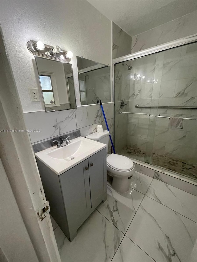 2801 Mayo St, Hollywood, FL 33020 - bathroom featuring toilet, a stall shower, vanity, and marble finish floor