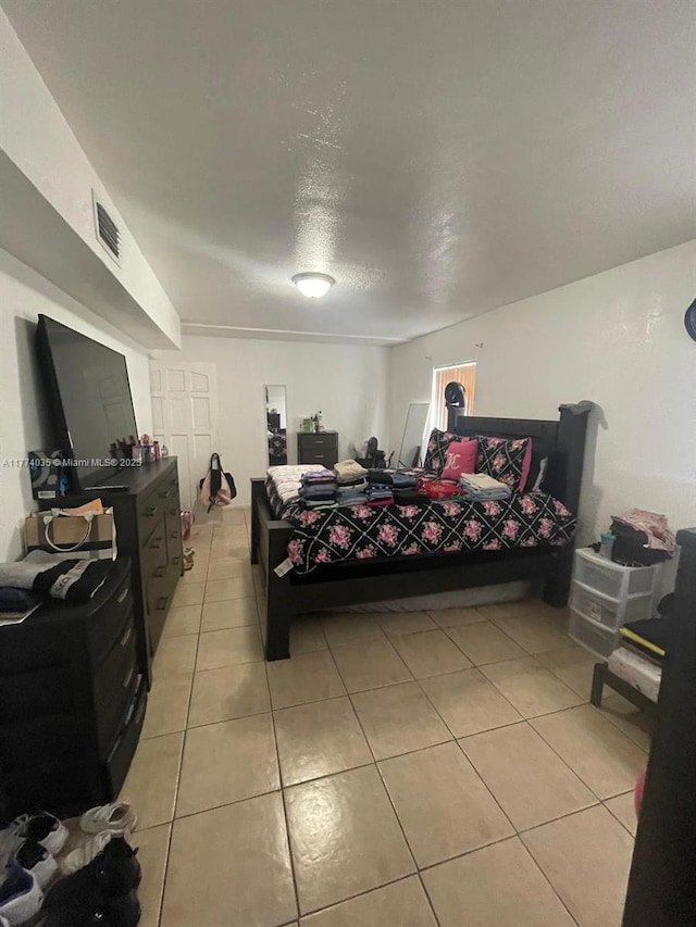 2801 Mayo St, Hollywood, FL 33020 - bedroom with visible vents and light tile patterned flooring