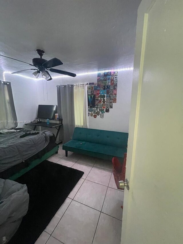 2801 Mayo St, Hollywood, FL 33020 - tiled bedroom featuring ceiling fan