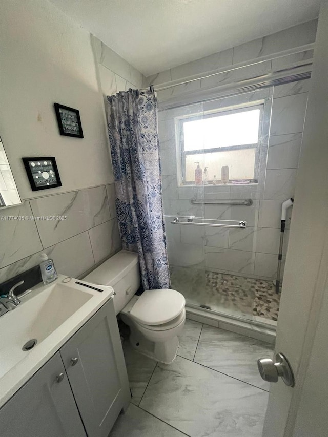 2801 Mayo St, Hollywood, FL 33020 - full bath featuring toilet, tile walls, a shower stall, and marble finish floor