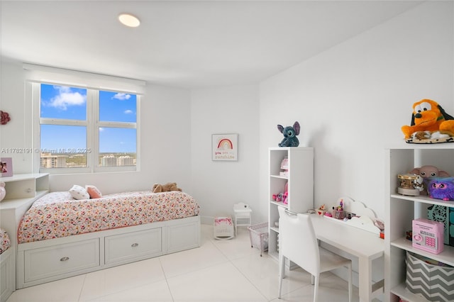 bedroom with light tile patterned floors