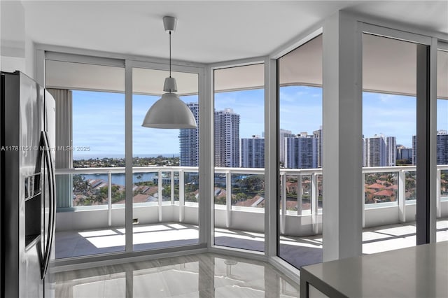 21055 Yacht Club Dr Unit 1409, Aventura, FL 33180 - unfurnished dining area featuring expansive windows and a view of city