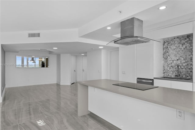 21055 Yacht Club Dr Unit 1409, Aventura, FL 33180 - interior space featuring visible vents, island range hood, a sink, modern cabinets, and white cabinetry