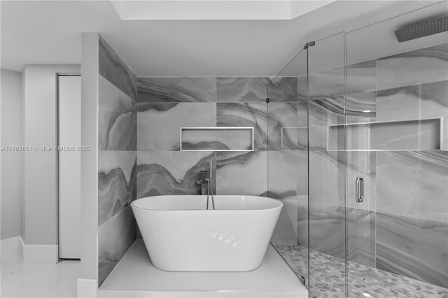 21055 Yacht Club Dr Unit 1409, Aventura, FL 33180 - bathroom with a soaking tub and a stall shower