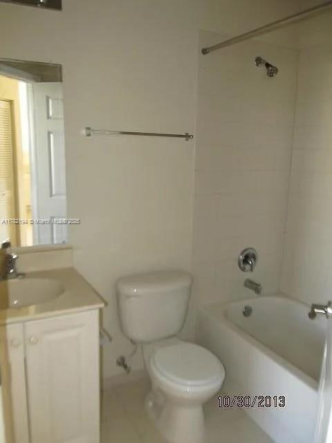 1961 Freeport Ln Unit 0, Riviera Beach, FL 33404 - unfurnished room featuring light tile patterned floors and baseboards
