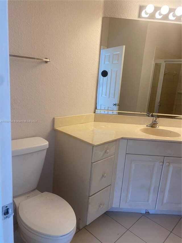 1961 Freeport Ln Unit 0, Riviera Beach, FL 33404 - tiled empty room featuring baseboards and ceiling fan