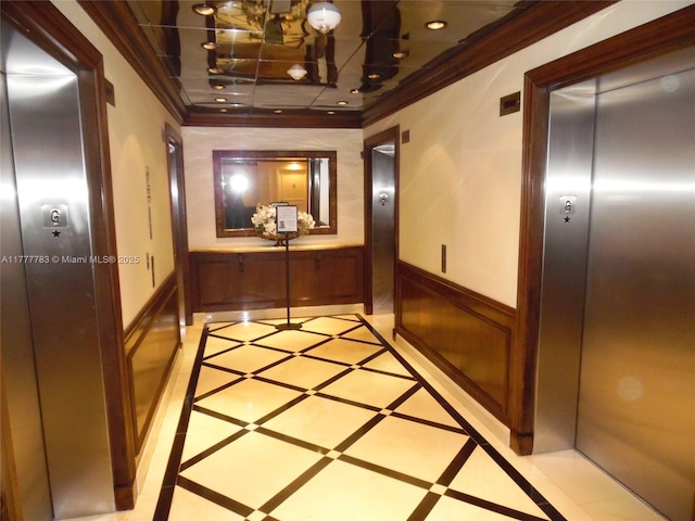 3530 Mystic Pointe Dr Unit 408, Aventura, FL 33180 - corridor featuring elevator, ornamental molding, and a wainscoted wall