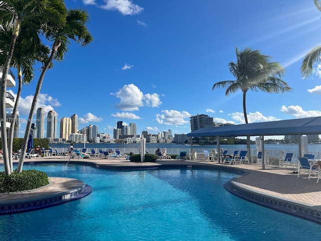 3530 Mystic Pointe Dr Unit 408, Aventura, FL 33180 - community pool with a patio and a view of city