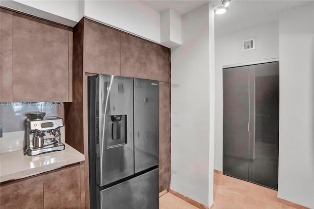 1755 E Hallandale Beach Blvd Unit 1608E, Hallandale Beach, FL 33009 - kitchen with stainless steel fridge, light countertops, modern cabinets, and light tile patterned floors