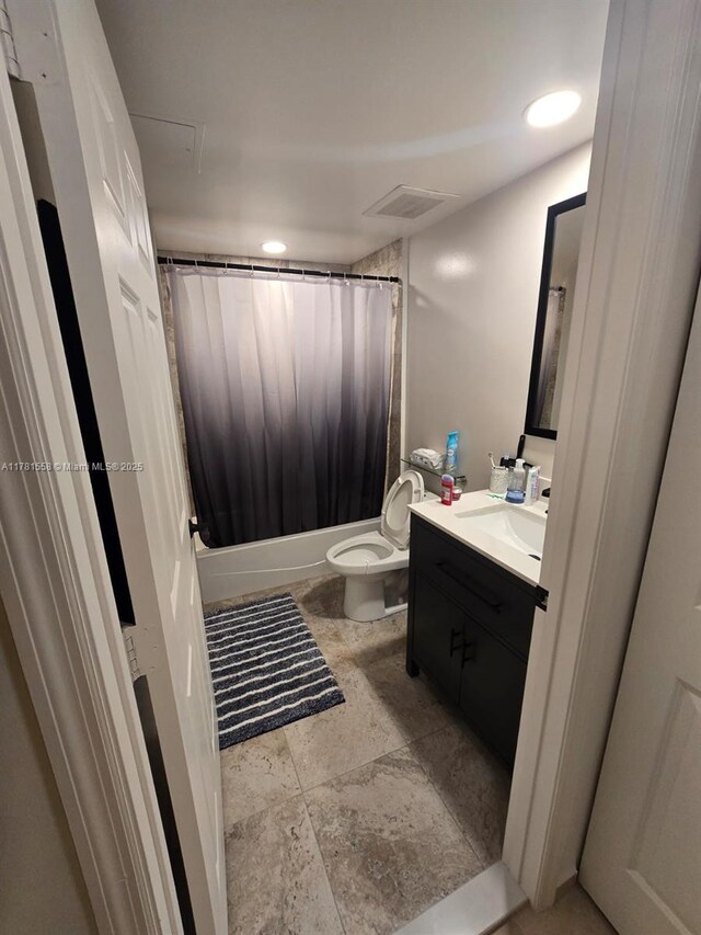 1755 E Hallandale Beach Blvd Unit 1608E, Hallandale Beach, FL 33009 - full bathroom featuring vanity, toilet, and shower / bath combo with shower curtain