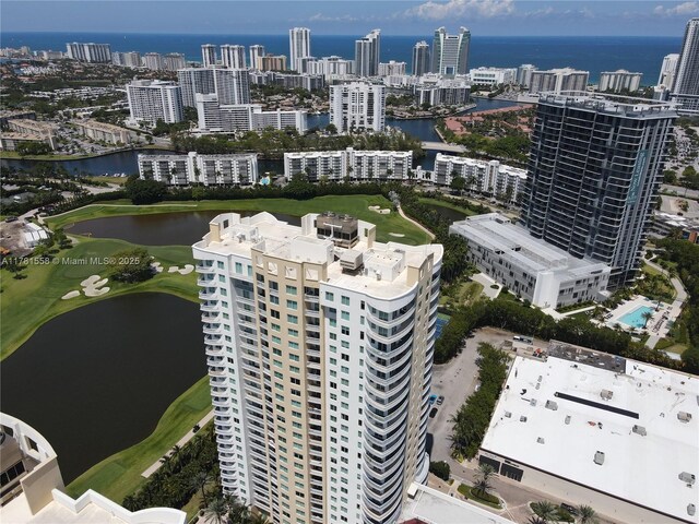 1755 E Hallandale Beach Blvd Unit 1608E, Hallandale Beach, FL 33009 - view of urban area with a nearby body of water, a golf club, and apartment complex / building