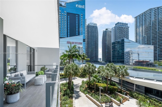 68 SE 6th St Unit 810, Miami, FL 33131 - balcony featuring a skyline view and an outdoor living space
