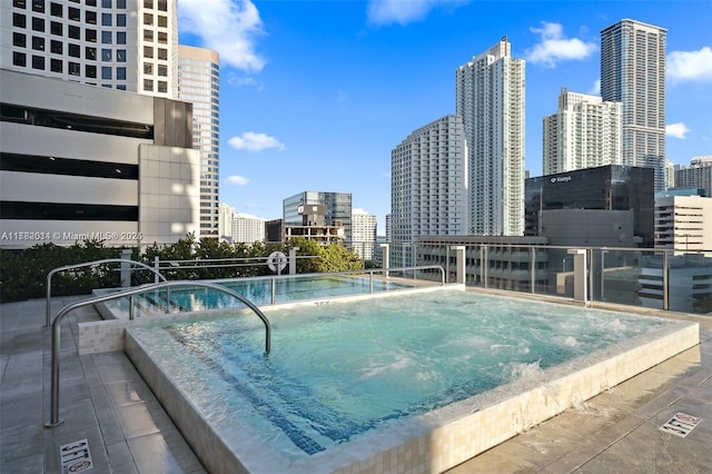 68 SE 6th St Unit 810, Miami, FL 33131 - community pool featuring a skyline view