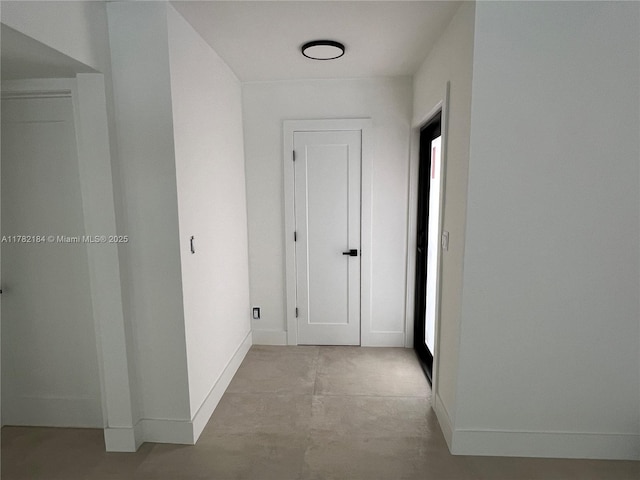 corridor with baseboards