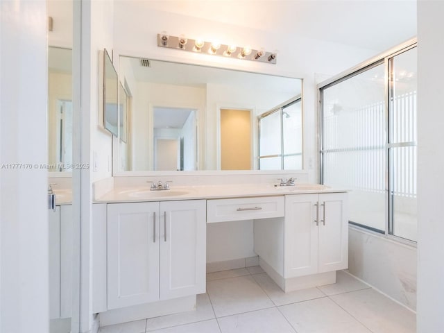 4242 Magnolia Ridge Dr, Weston, FL 33331 - full bathroom with tile patterned floors, double vanity, and a shower with shower door