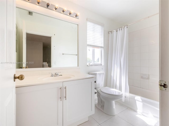 bathroom with tile patterned floors, shower / tub combo with curtain, vanity, and toilet