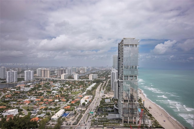 city view featuring a water view and a view of the beach