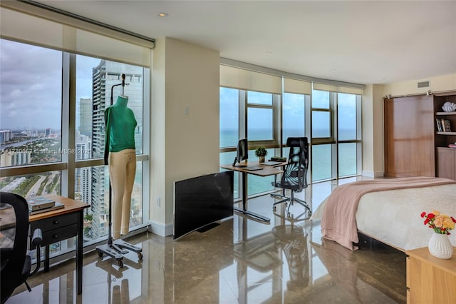 bedroom with baseboards, floor to ceiling windows, and visible vents