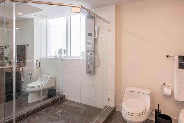 full bathroom with tile patterned flooring, a stall shower, and toilet