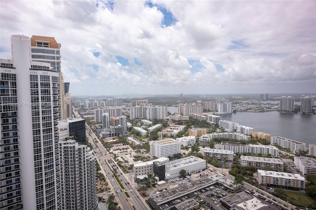 aerial view featuring a water view and a city view