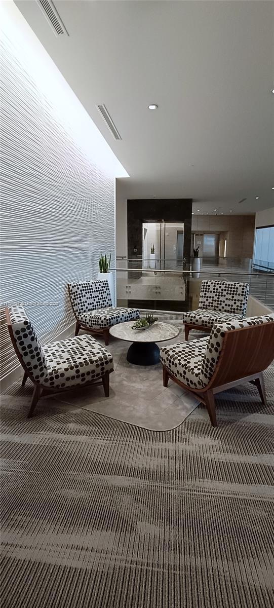 lobby featuring visible vents