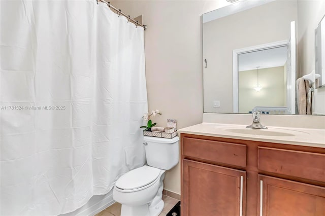 full bath featuring toilet, curtained shower, and vanity