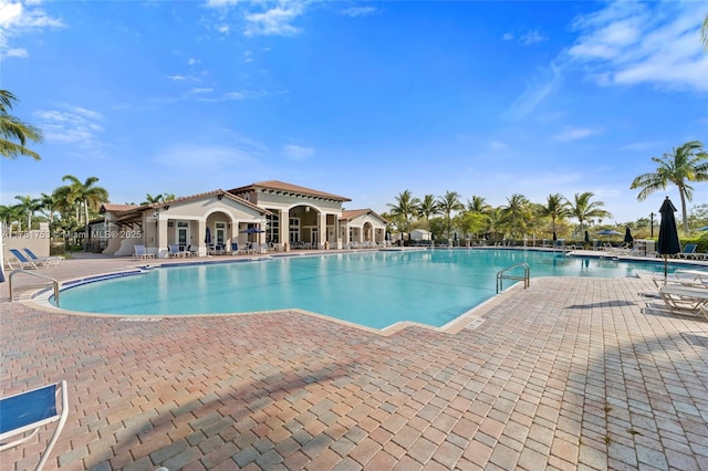 pool featuring a patio area