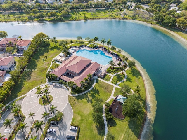 birds eye view of property featuring a water view