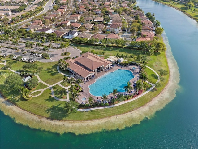 birds eye view of property featuring a water view